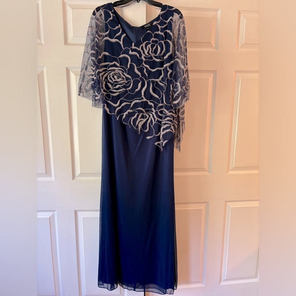 Mother of bride/groom blue cape-style dress. Brand new. Never worn. Size 16.